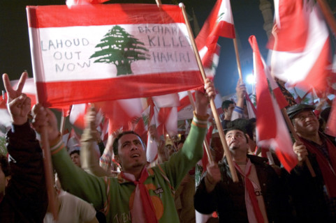 Lebanese protestors celebrate victory at Martyr's Square in Beirut