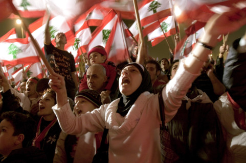 Lebanese protestors celebrate victory at Martyr's Square in Beirut
