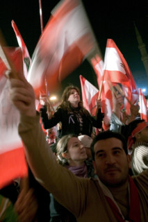Lebanese protestors celebrate victory at Martyr's Square in Beirut