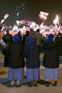 Lebanese protestors celebrate victory at Martyr's Square in Beirut