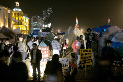 Lebanese protestors celebrate victory at Martyr's Square in Beirut