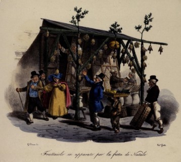 Fruit and vegetable vendor decorating his stand for Christmas