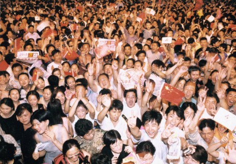 Celebrating victory after Beijing has been named host of the 2008 Olympics