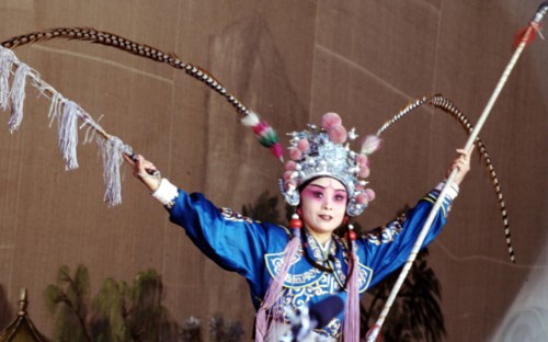 A girl playing the Beijing Opera