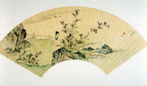 Motifs traditionnels chinois peints sur un éventail