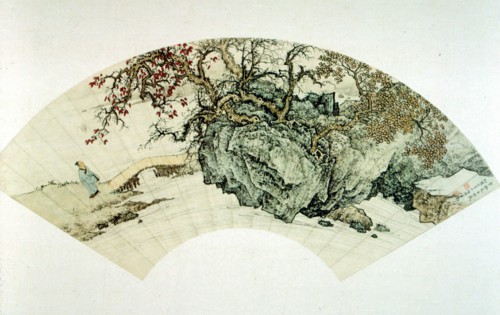 Motifs traditionnels chinois peints sur un éventail