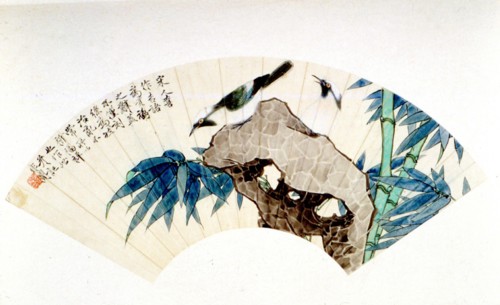 Motifs traditionnels chinois peints sur un éventail