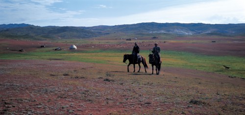 Kazaks à cheval, province du Xinjiang, Chine