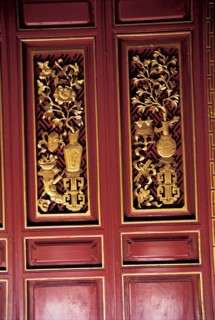 Lijiang, Yunnan Province, wooden carvings, China