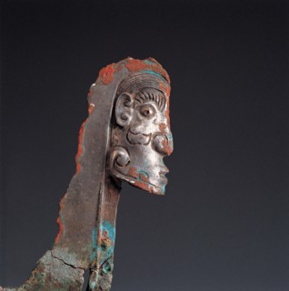 face-shaped ornament from West Zhou Dynasty of ancient Chinaon bronze halberd