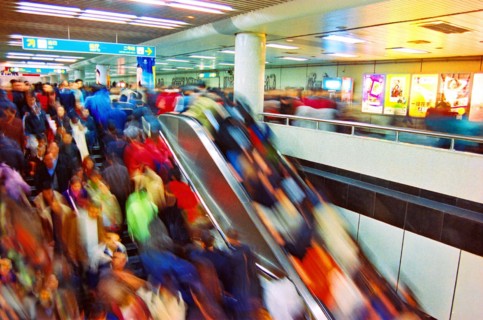 Crowded peopel stand the escalator of subway station of Shanghai,China