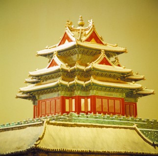 a corner tower of the Forbidden City in snow,Beijing,China