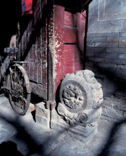 Stone drum in the doorway of Siheyuan courtyard,Beijing,China