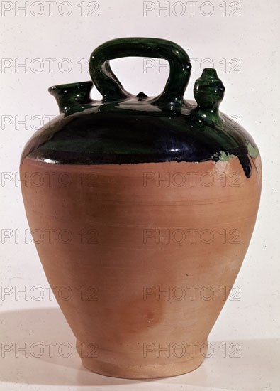 BOTIJO PARCIALMENTE VIDRIADO EN VERDE OSCURO-ARTE POPULAR
TORREDEMBARA, COLECCION