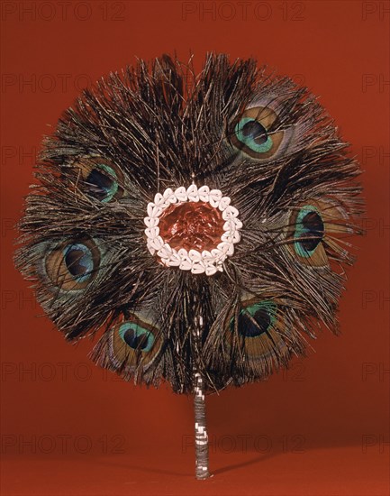 ABANICO TALISMAN CONTRA EL MAL DE OJO DE PLUMAS D PAVO
CALABRIA, EXTERIOR
ITALIA

This image is