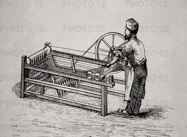 HARGREAVES JAMES
GRABADO DE MAQUINA DE HILAR CONOCIDA COMO SPINNING JENNY-1764

This image is