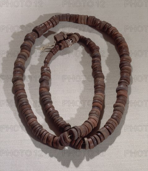 COLLAR DE CUENTAS - CERAMICA GUANCHE
SANTA CRUZ, MUSEO ARQUEOLOGICO
TENERIFE

This image is not