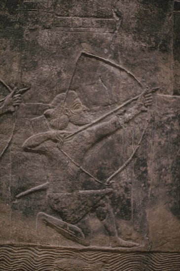 RELIEVE PALACIO NINIVE-ARQUERO ATACANDO CIUDAD
LONDRES, BRITISH MUSEUM
INGLATERRA

This image