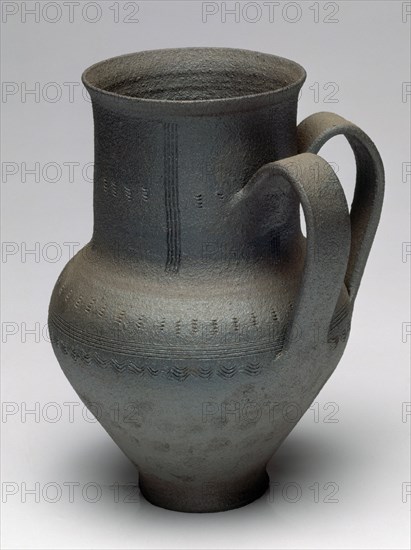 JARRA DE CERAMICA NEGRA CON 2 ASAS Y DECORACION INCISA-ARTE POPULAR
FARO, COLECCION