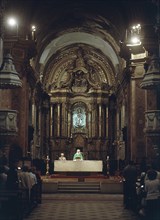 INTERIOR-NAVE PRINCIPAL CON SACERDOTE OFICIANDO MISA
BUENOS AIRES, CABILDO
ARGENTINA

This