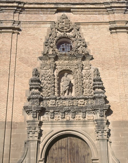 ONOFRE ESCOL PEDRO
DET- PORTADA CENTRAL LABRADA CON LA ESCULTURA  DE S JUAN BAUTISTA S