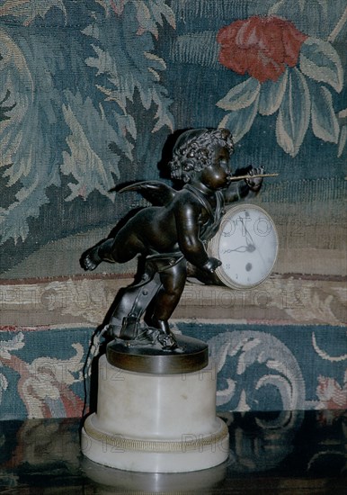 INTERIOR-RELOJ DE CHIMENEA CON CUPIDO TOCANDO LA FLAUTA EN BRONCE Y MARMOL
NACION, COUNTRY SIGLO