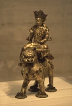 MANJUSRI SOBRE EL LEON-BODISATUA DE LA SABIDURIA-CHINA-DINASTIA SONG 960/1279 -BRONCE DORADO
FORT