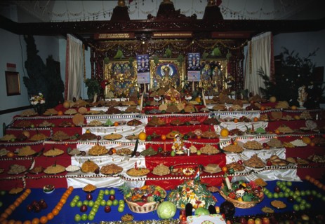 A temple altar covered with offerings at the Diwali festival