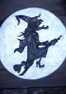 Classic Wicca image of a crone riding on her broomstick
