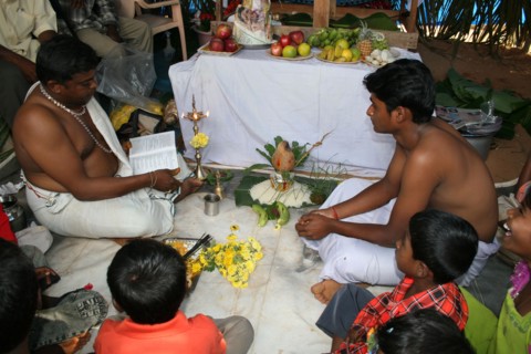 Brahmin priest presiding at the sacred thread ceremony
