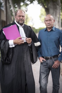 Loïc Sécher et son avocat Eric Dupond-Moretti