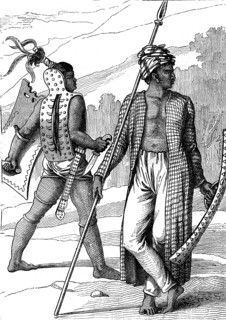 Warriors of the Ombay island and the Guébè island , near Timor island.Travel
by Louis de