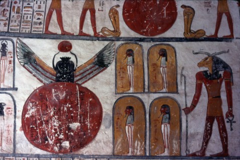 Tomb of Ramses VI. Ram-headed god standing before four chapels with a mummy "the body of Osiris and Geb", and a large disk out of which is coming a winged scarab