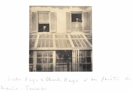 Victor Hugo and Charles Hugo at the window of Marine Terrace.
