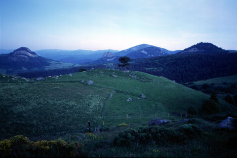 View from the D410 road towards, from l. to r., Roche de Borée, Gouleyou, Suc de Sara, Suc de Touron