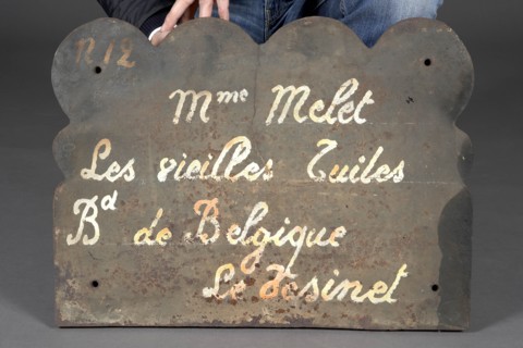 Rateau, Verso d'une plaque de cheminée