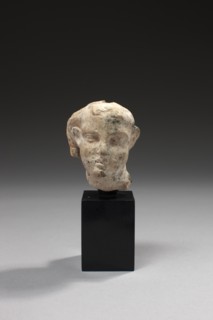 Tête de statuette représentant un jeune garçon