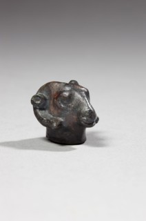 Poids en forme de tête de bélier