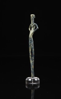 Statuette votive représentant un homme filiforme