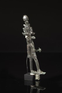 Statuette votive représentant un dieu à tête de serpent, probablement Nehebkaou