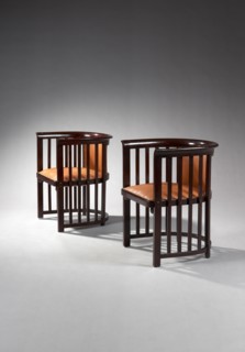 Pair of armchairs with wraparound backrest