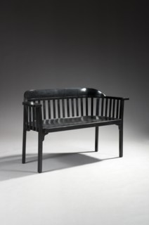 Sofa with a wraparound backrest