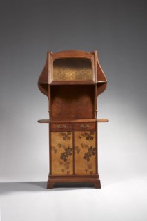 Louis Majorelle (1859-1926)
Storage cabinet at console height with a curvaceous form.
The upper