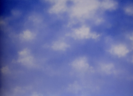Cloudy sky. Painted canvas tarp