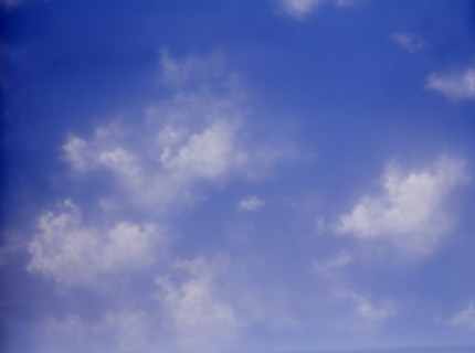 Cloudy sky. Painted canvas tarp