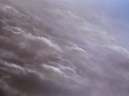Cloudy sky. Painted canvas tarp