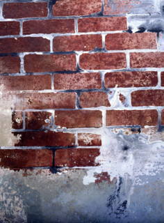 Painted backdrop. Partly destroyed brick wall