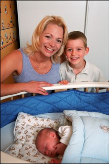 09/00/2001. Close up Muriel Hermine former Synchronized Swimming champion introduces her new born baby Killian