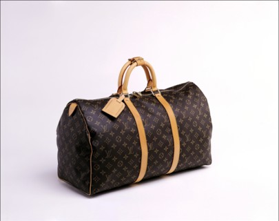 00/00/2001.  Close-up on luxury luggage Patrick Louis Vuitton in his workshop.