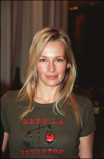 12/20/2001. Model Estelle Lefebure supports "Pour un monde plus juste, mets la pression" (for a fairer world, apply pressure) campaign.
